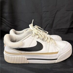 Nike White Low-Top platform Sneakers with Black Swoosh and Cream Trim